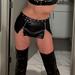 Ella Divine Jacksonville in a black outfit and tall boots.
